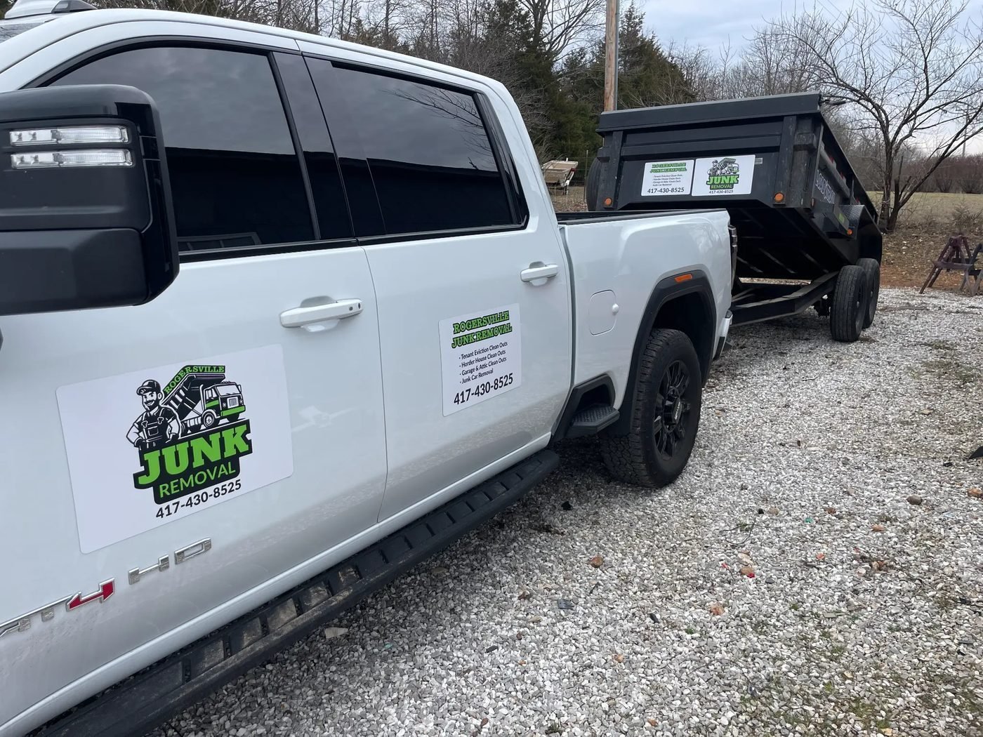 Rogersville Junk Removal truck with logo — professional junk hauling in Rogersville, MO